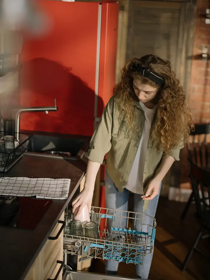 a challenging dishwasher being used